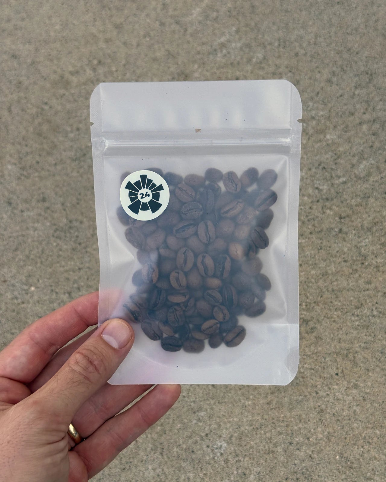 A numbered bag held in hand
